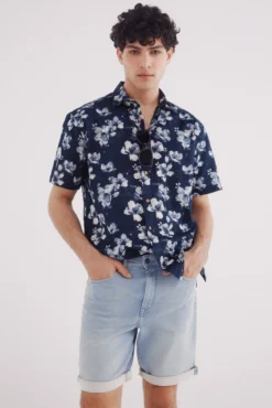 Bermuda denim slim fit de malha leve