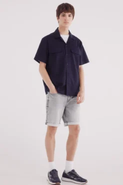 Bermudas de ganga em knit denim