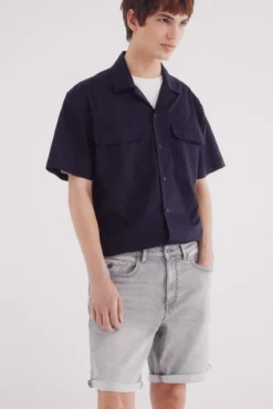 Bermudas de ganga em knit denim