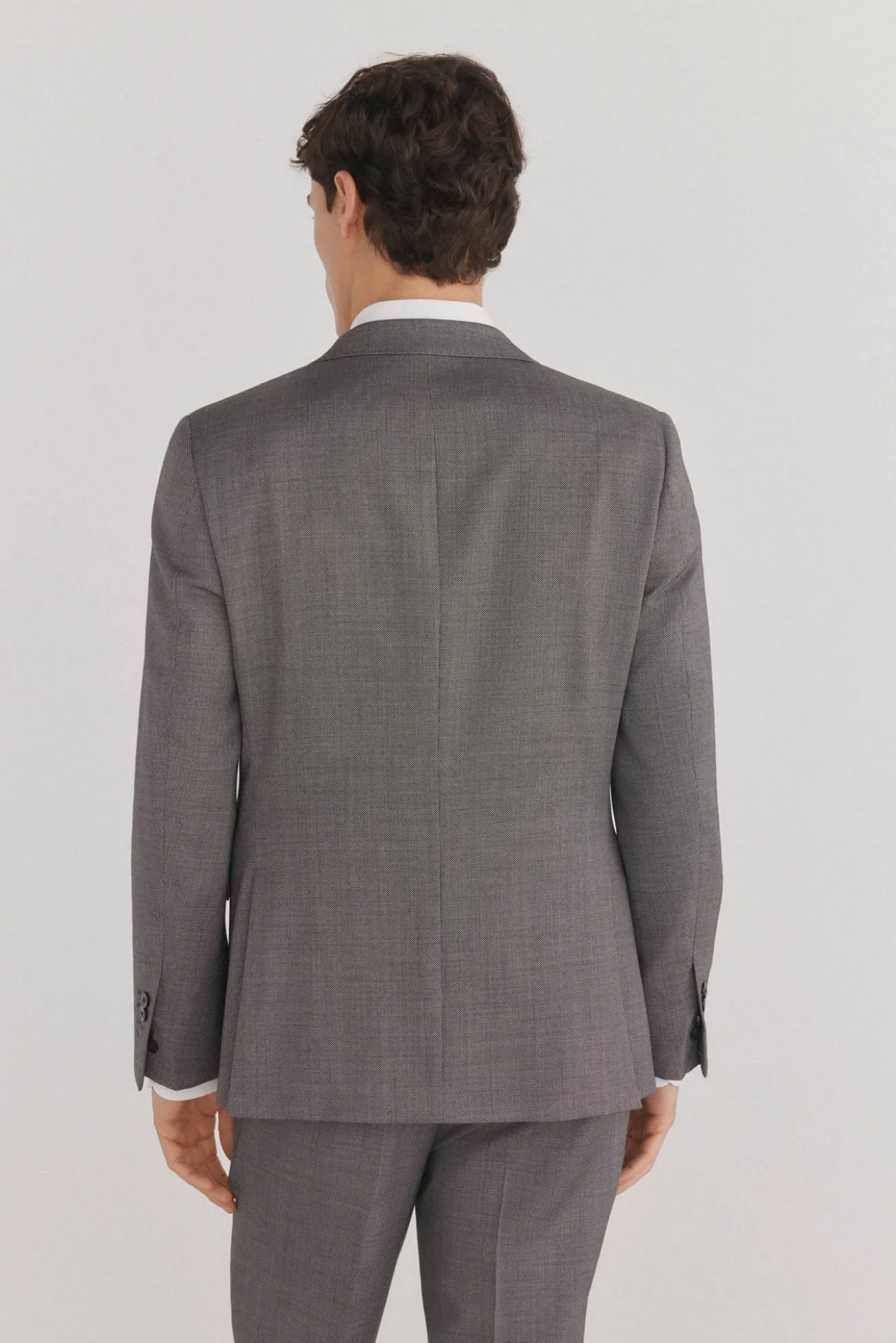 Blazer estilo olho de pássaro com dois elásticos e corte slim