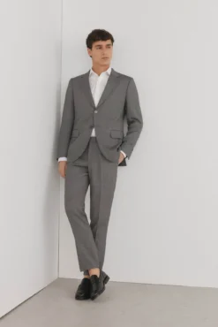 Blazer estilo olho de pássaro com dois elásticos e corte slim