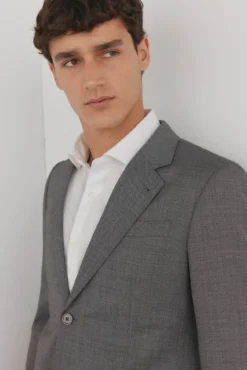 Blazer estilo olho de pássaro com dois elásticos e corte slim