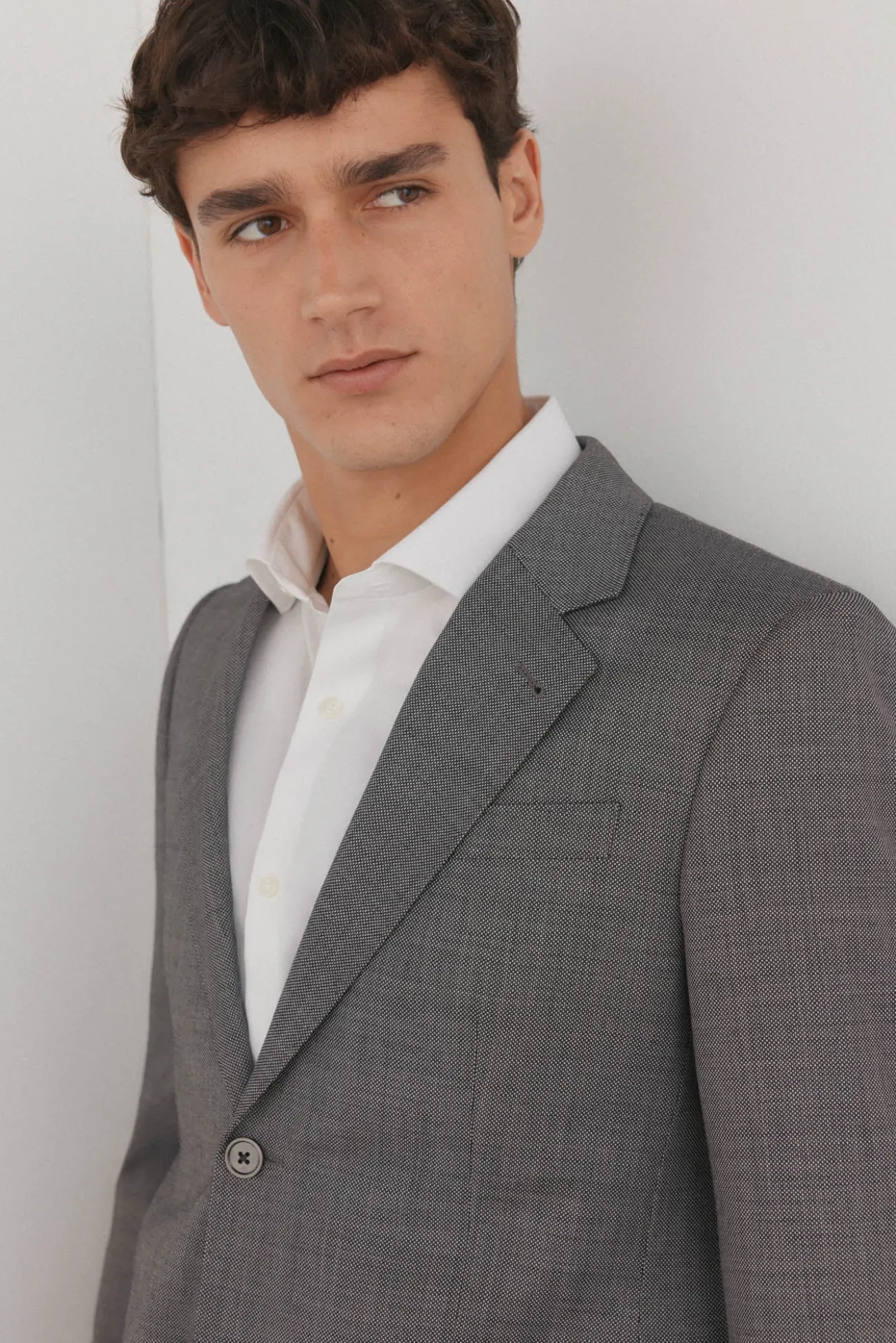 Blazer estilo olho de pássaro com dois elásticos e corte slim