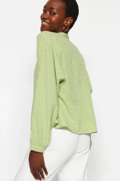 Blusa abotoada