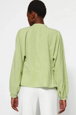 Blusa abotoada
