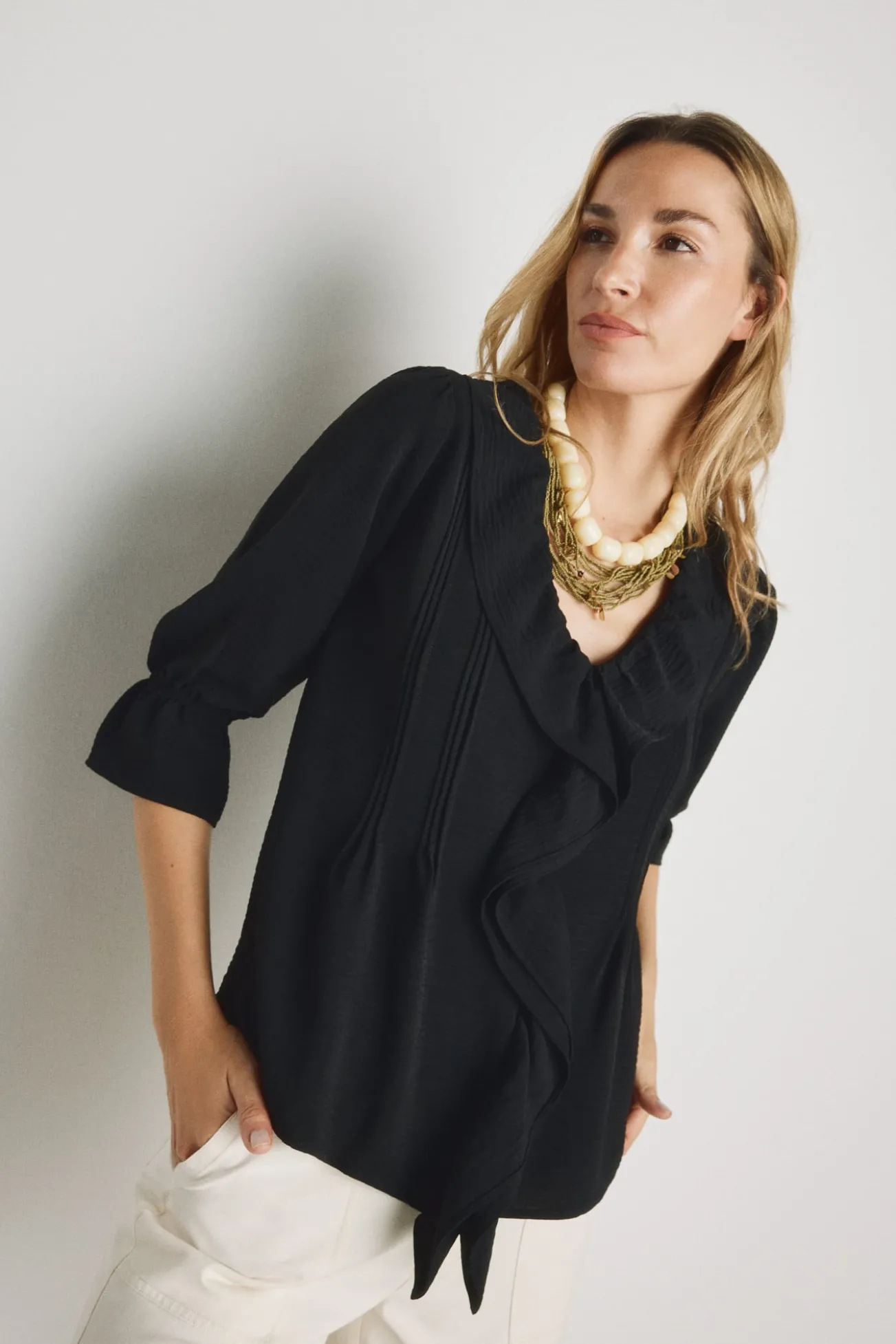 Blusa com folhos