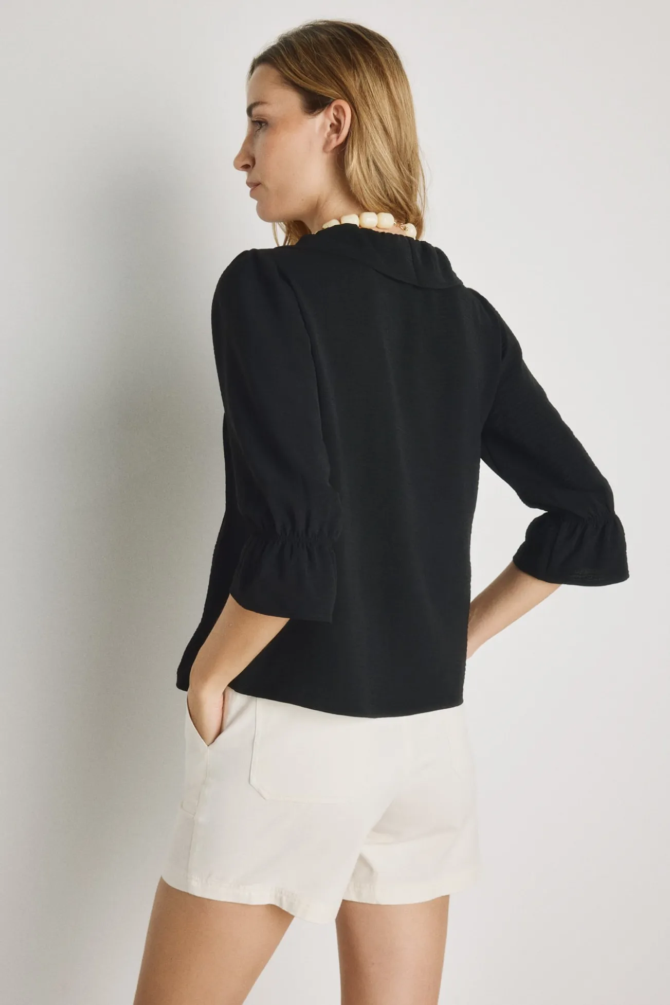 Blusa com folhos