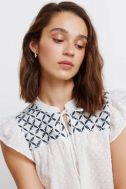Blusa com folhos em plumeti