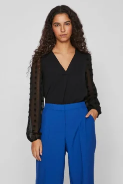 Blusa com plumeti nas mangas