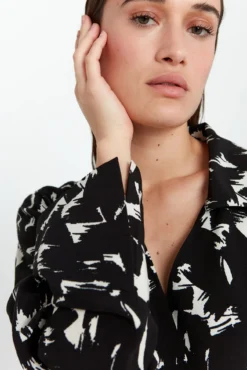 Blusa de manga comprida cruzada