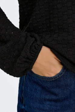 Blusa texturizada de manga comprida