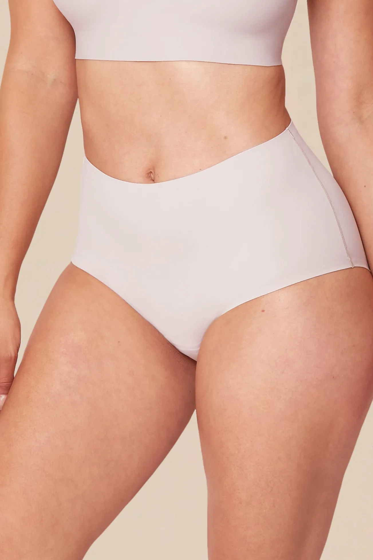 Braga menstrual talle alto arena – Absorción media