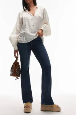 Calça jeans flare de cintura alta