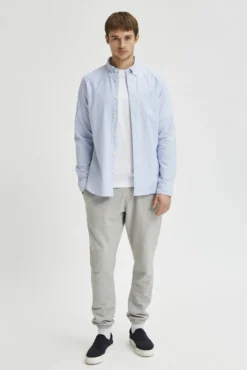 Camisa de manga comprida com bolso 100% algodão