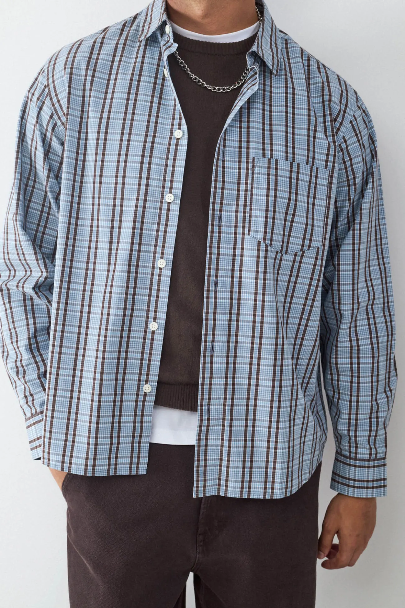 Camisa oversized de manga comprida com bolso
