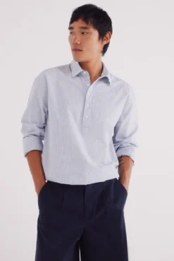 Camisa polo riscas