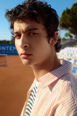 Camisa polo riscas