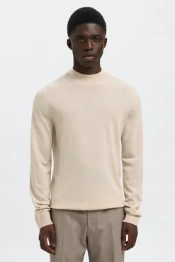 Camisola de gola falsa 100% lã merino.
