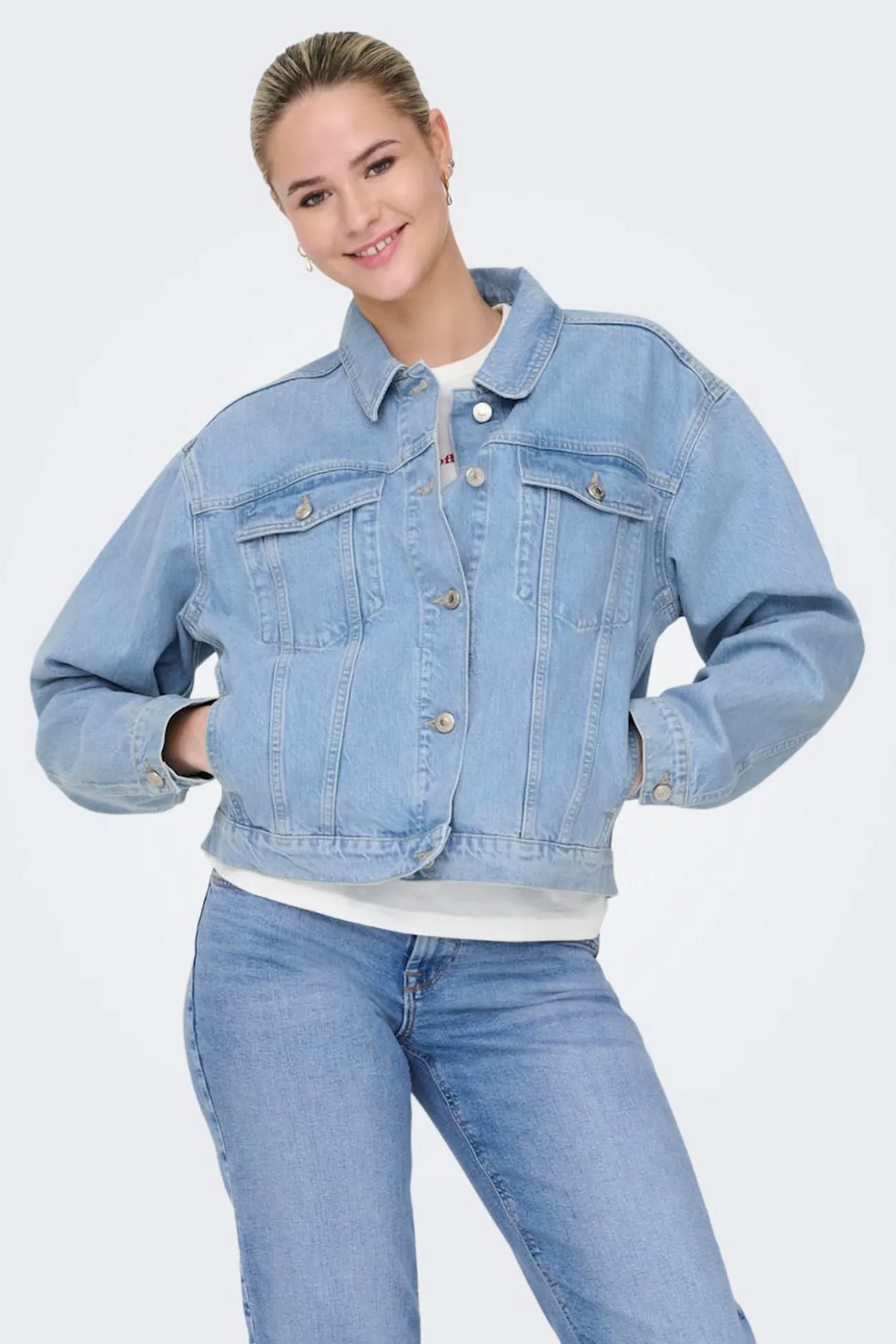 Casaco denim bolsos frontais
