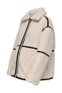 Jaqueta teddy bege para pré-mamã com detalhe de fitas preta