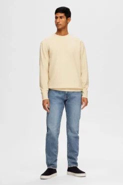 Jeans Slim Fit confecionados com algodão orgânico