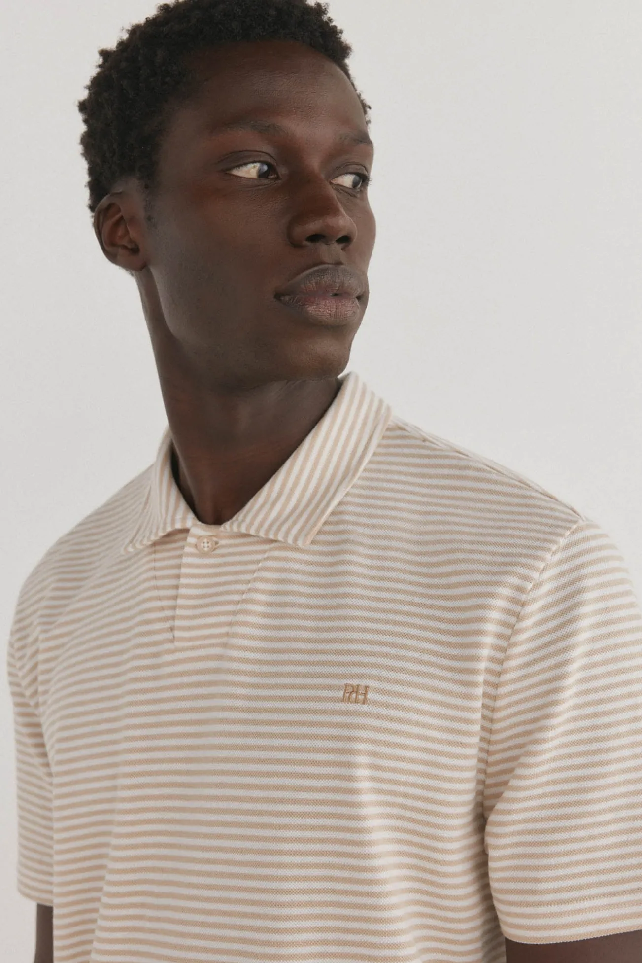 Polo riscas gola aberta