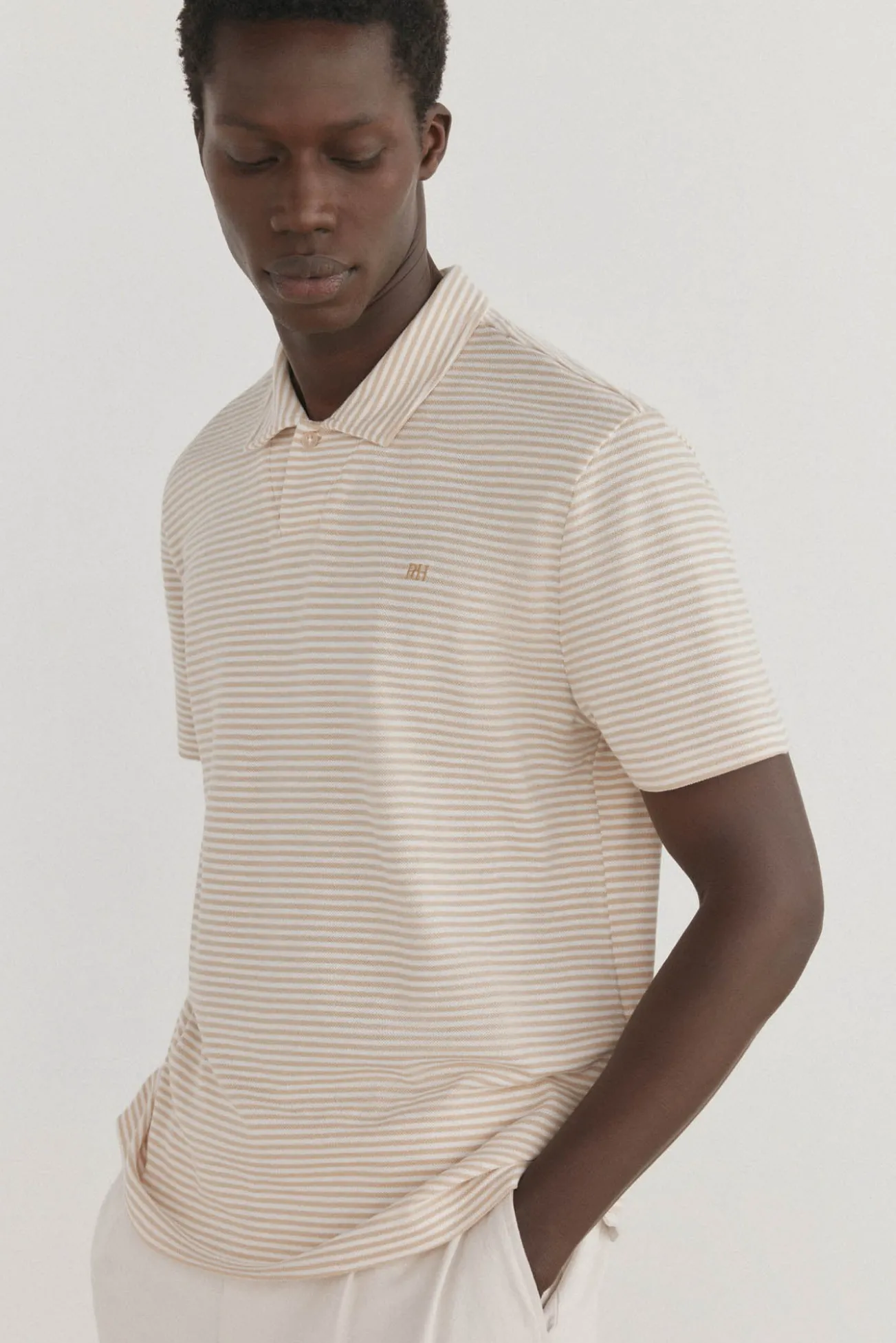 Polo riscas gola aberta