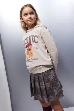 Saia plissada xadrez para menina
