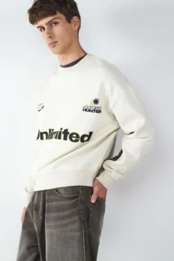Sweatshirt com gola redonda e estampado de futebol